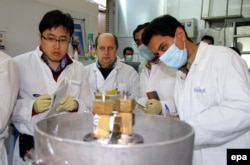 An IAEA team checks the uranium enrichment process at an Iranian nuclear plant. (file photo)