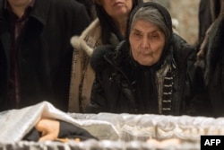 Then 87 years of age, Boris Nemtsov's mother, Dina, attends her son's funeral in Moscow in March 2015.