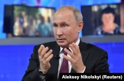 Russian President Vladimir Putin speaks during the marathon call-in show.