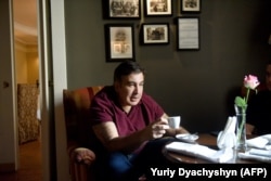 Former Georgian President Mikheil Saakashvili drinks coffee in the lobby of his hotel in the central western Ukrainian city of Lviv on September 11.