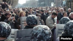 Riot police confront opposition protesters in Yerevan on March 1, 2008.