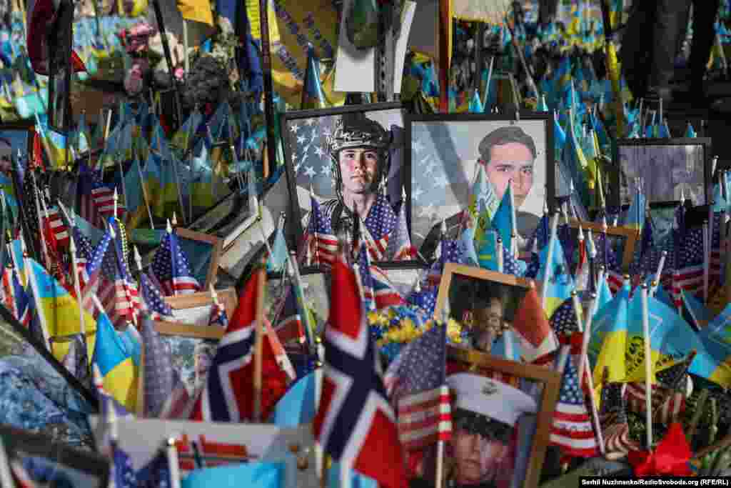 Portraits of American fighters include Ethan Hertweck (top center), a 21-year-old US Marine Corps veteran who was killed in the Donbas in December 2023.